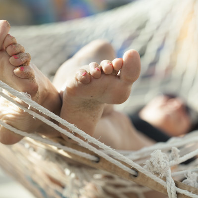 girl in a hammock on the beach